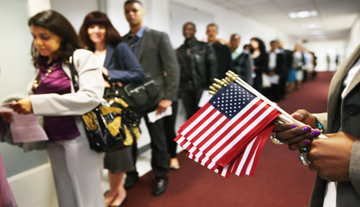 NEW YORK, NY - MAY 17:  Immigrants wait to become American citizens ahead of a naturalization ceremony at the U.S. Citizenship and Immigration Services (USCIS), office on May 17, 2013 in New York City. One hundred and fifty immigrants from 38 different countries became U.S. citizens at the event. Some 11 million undocumented immigrants living in the U.S. stand to eventually gain American citizenship if Congress passes immigration reforms currently being negotiated.  (Photo by John Moore/Getty Images)